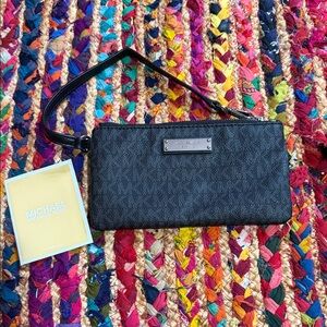 Michael Kors Black Signature Wristlet with Silver Plate